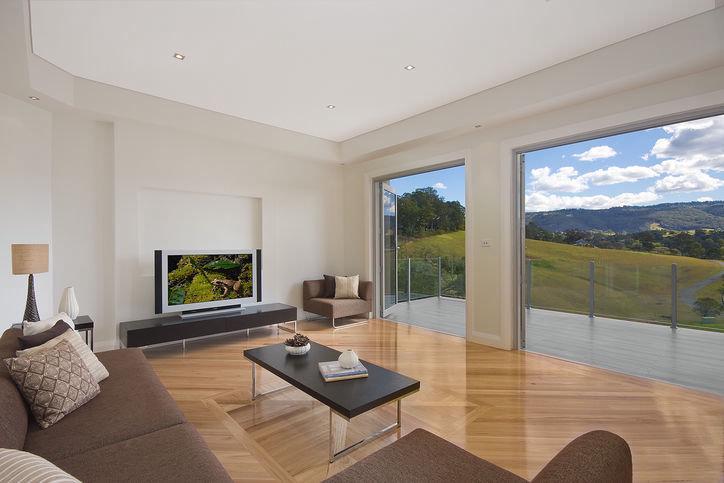 Gorokan — Living room opening to a deck with rural valley views