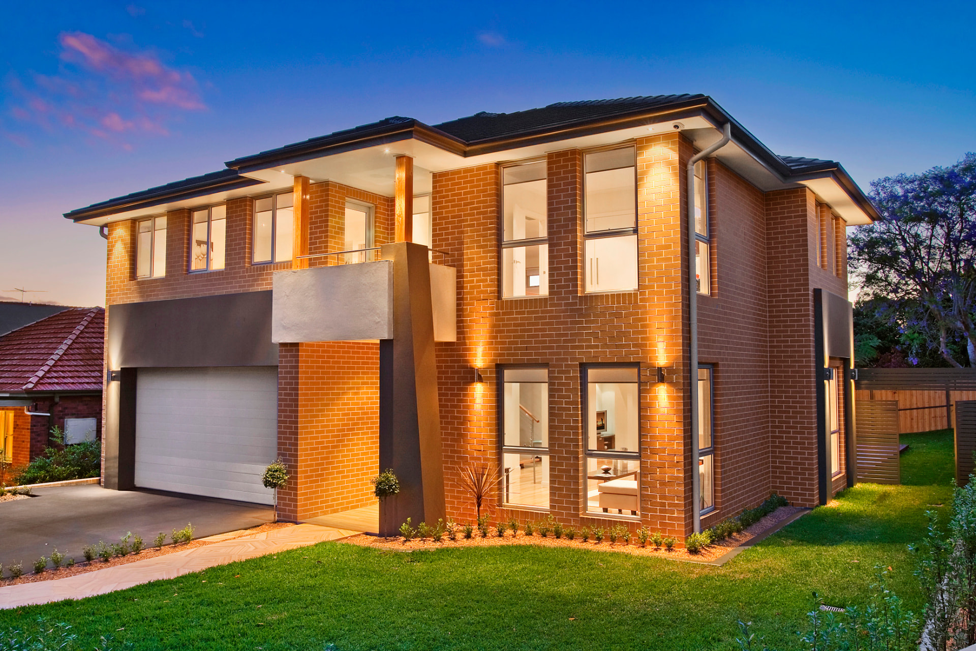 Riverview — Two-storey brick residence at dusk