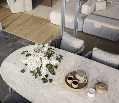 The Jewel, Soldiers Point — Stone dining table with tea service and timber flooring beyond