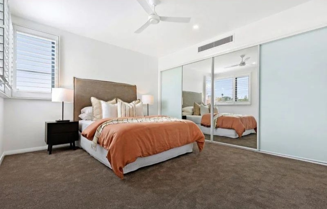Bar Beach — Bedroom with mirrored built-in robes