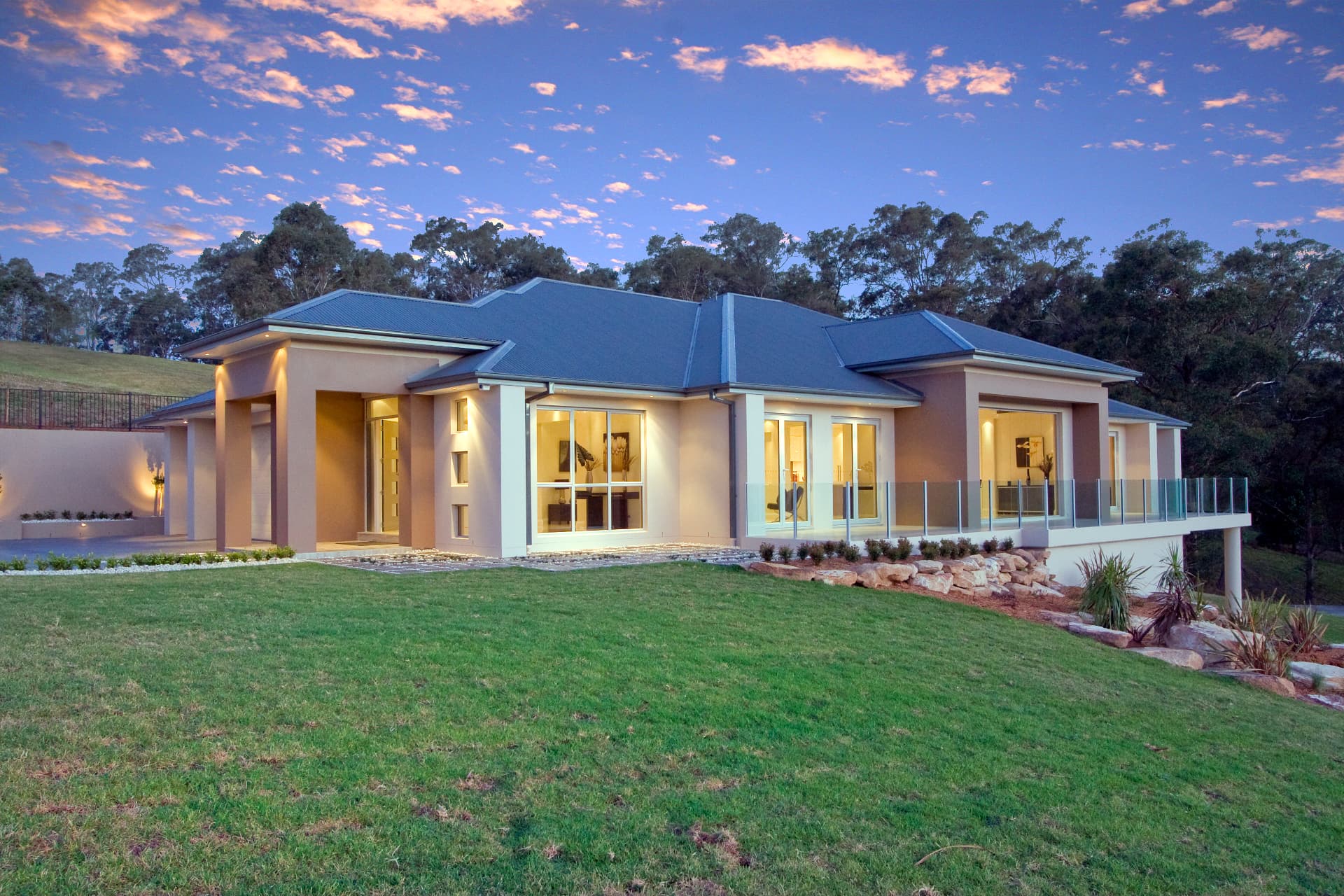 Kurrajong — Single-level residence at dusk with valley outlook